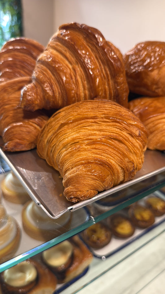 Freshly baked croissants at Krumb Bakery Belfast, golden and hand-laminated