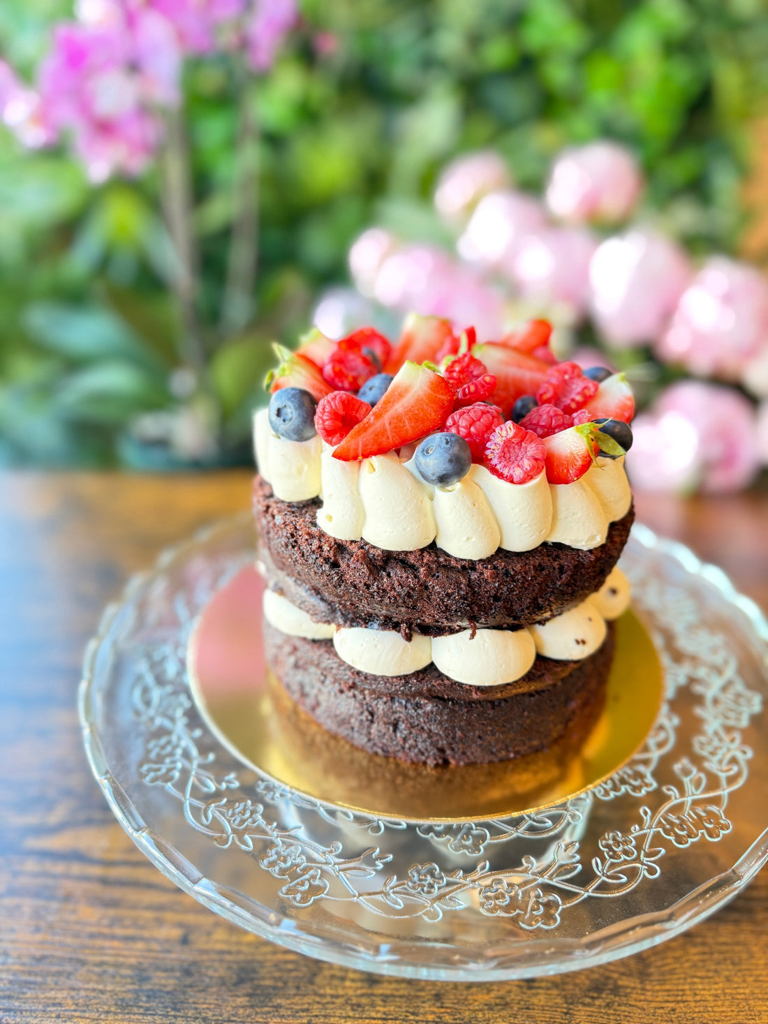 Custom celebration cake slice showing handmade layers and filling, crafted by Krumb Bakery Belfast