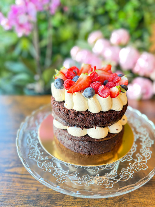 Handmade cake slice with layers of sponge and cream, part of the Krumb Bakery wedding cake tasting experience in Belfast
