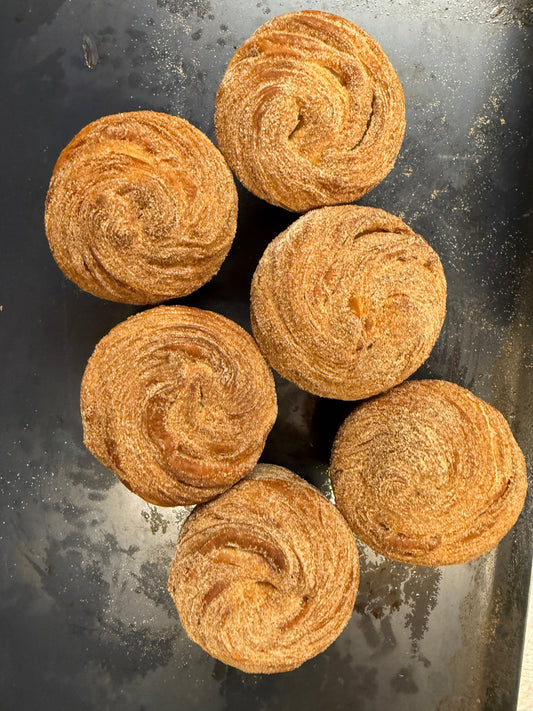 Golden cruffin with flaky pastry petals from Krumb Bakery Belfast